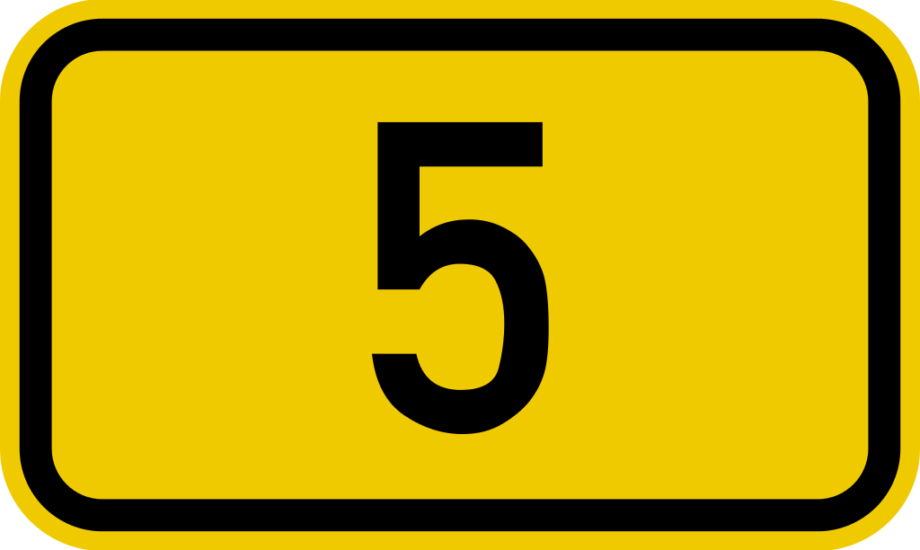 A black numeral 5 on a yellow rectangular sign