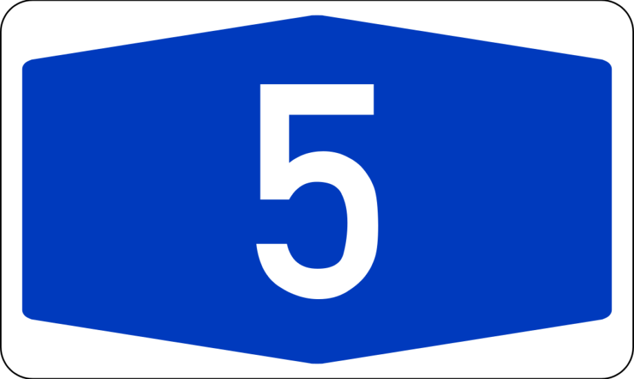 A white numeral 5 on a blue sign in the shape of an elongated hexagon.